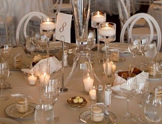 Mix Of Candles With Clear Holders For Rectangle Table