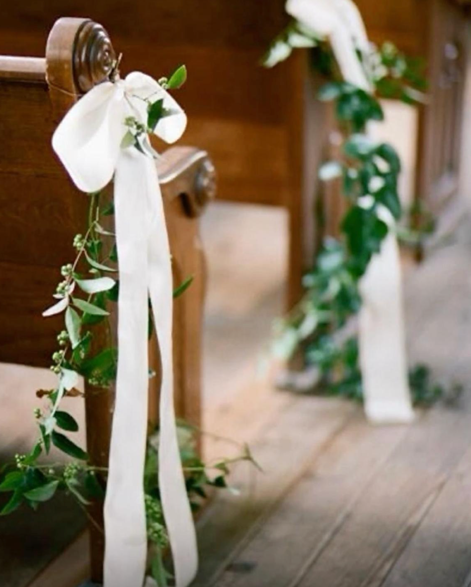 Church Pews Decoration With Light Ivory Fine Ribbons And Aisle Closing With Light Foliage