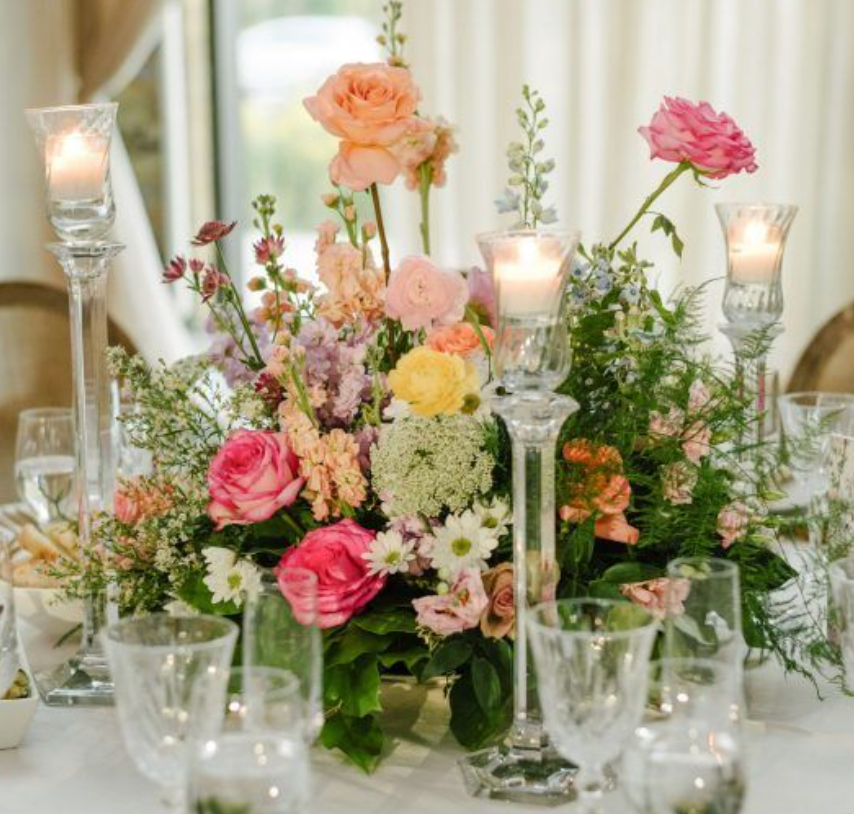 Short wedding centerpiece por round table