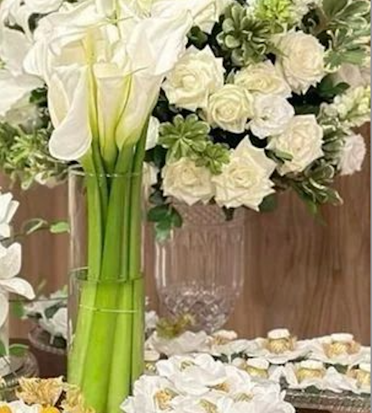 White Calla Lilys or similar