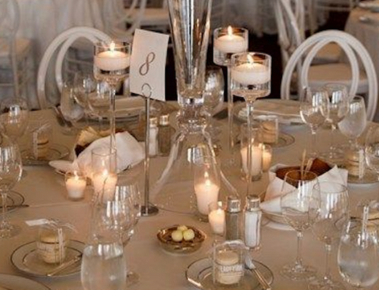 Mix of Candles with Clear Holders for round table